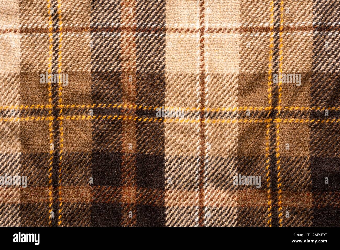 Braun geprüft. Schottische wolle. Stoff für Mantel Plaid. Close-up. Hintergrund Stockfoto