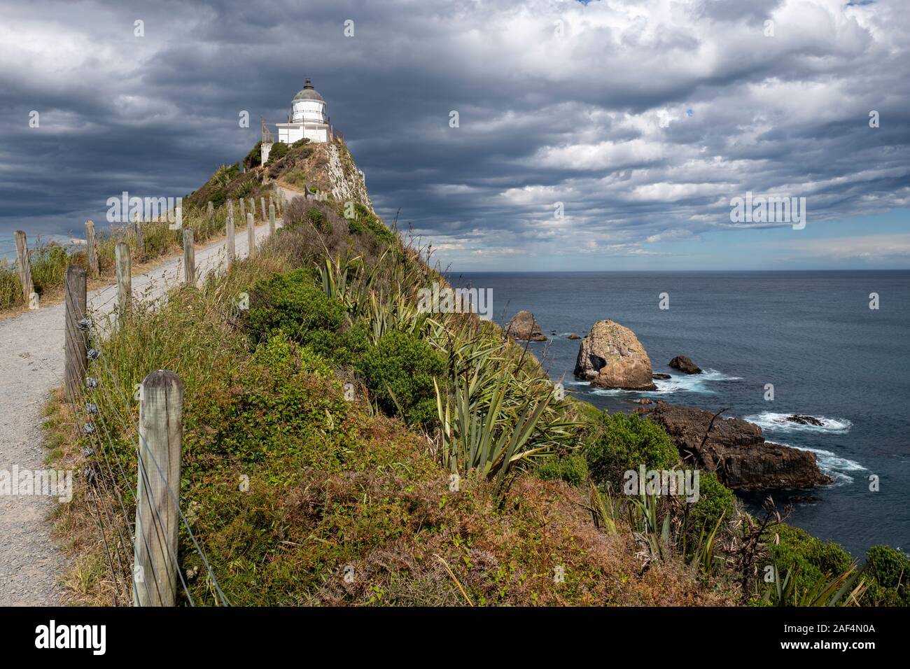Nugget Point Lighthouse an der Catlins, Otago, Neuseeland Stockfoto
