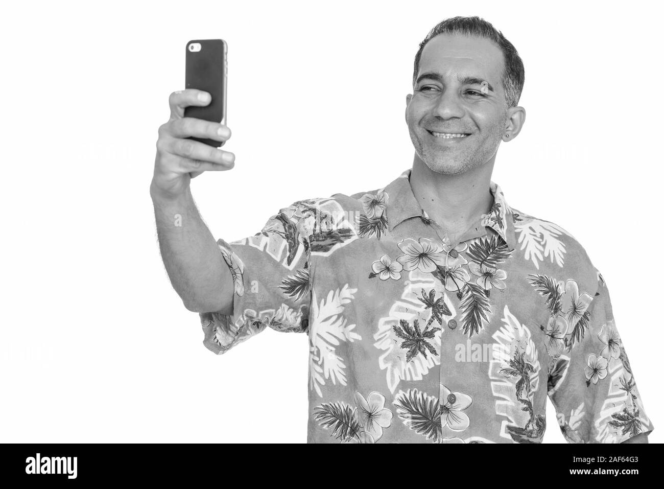 Reifen glücklich Persischen Mann bereit für den Urlaub nimmt selfie Stockfoto
