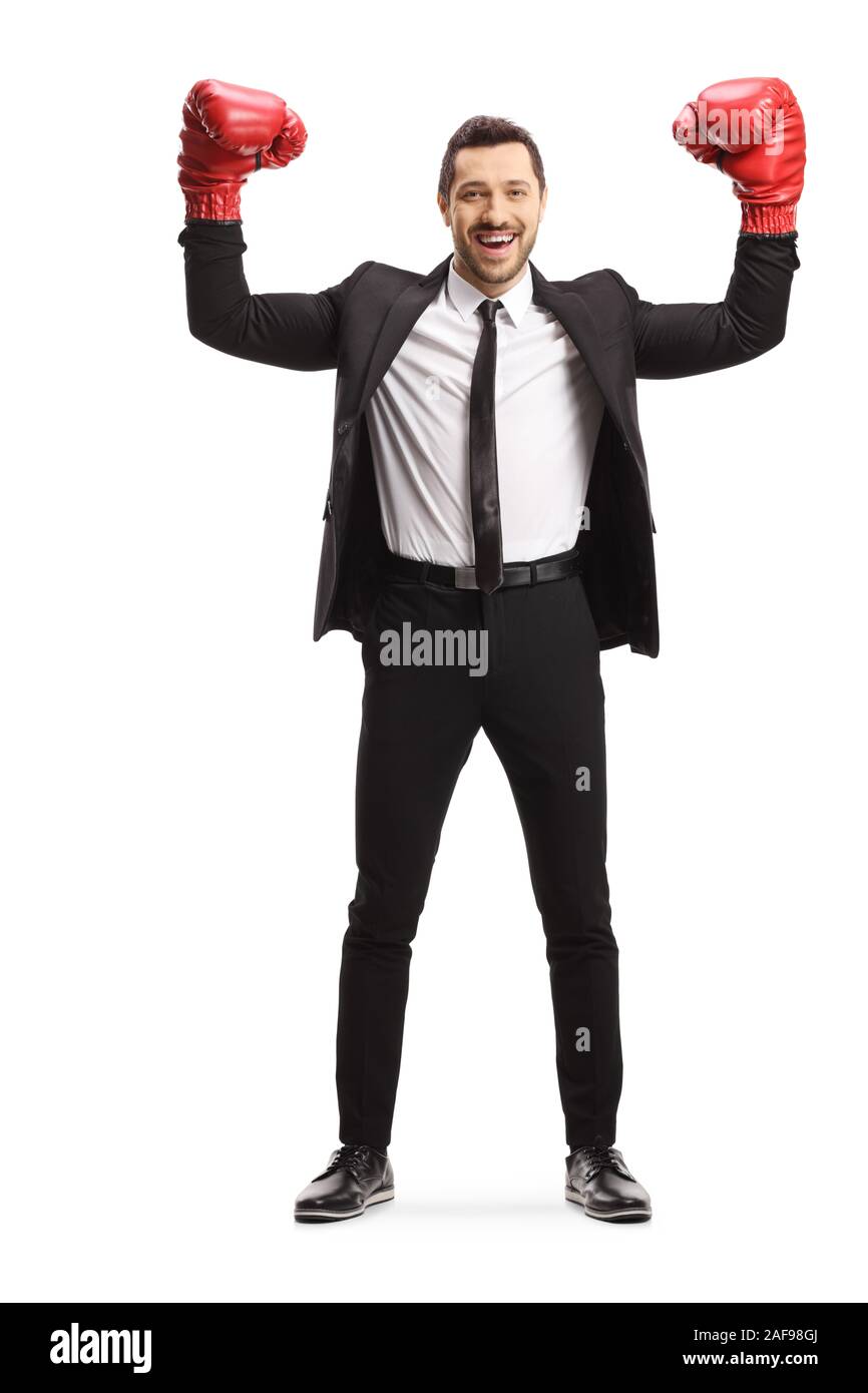 In voller Länge Porträt eines Geschäftsmannes mit Boxhandschuhen Gestik Gewinn auf weißem Hintergrund Stockfoto