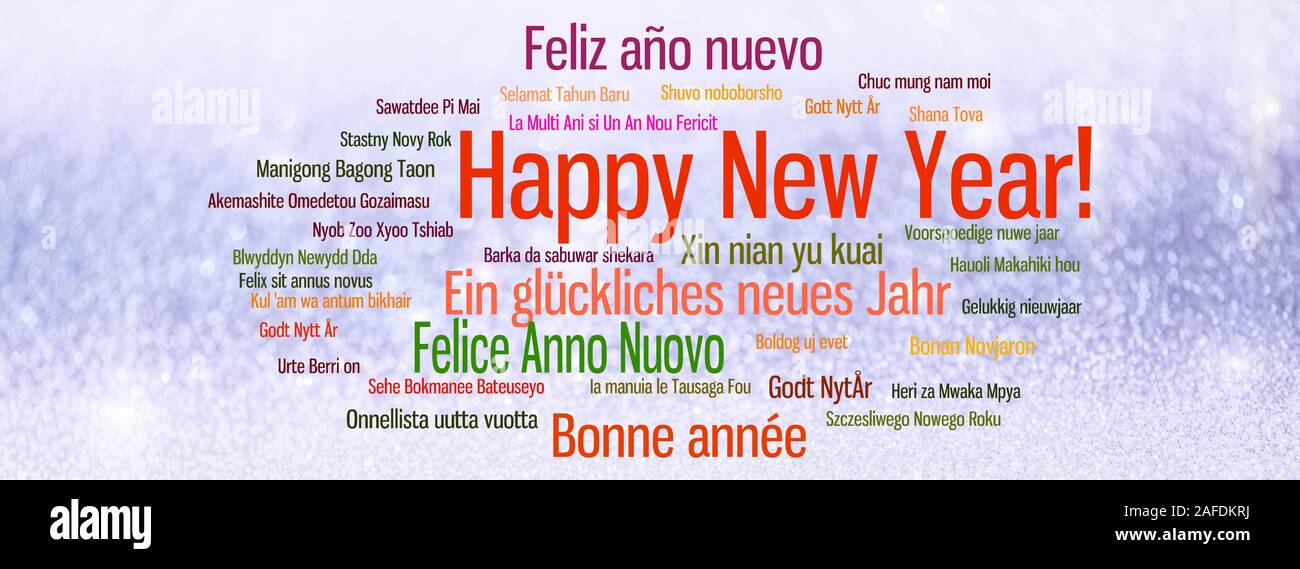 Frohes Neues Jahr verschiedene Sprachen Grüße auf unscharfen blau Schnee leuchtenden Hintergrund Stockfoto