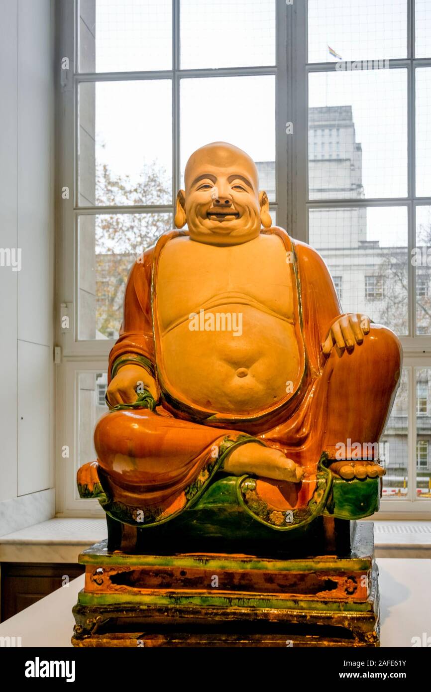 Buddhistischen chinesischen Steinzeug Abbildung, Budai, British Museum, London, England, Großbritannien Stockfoto