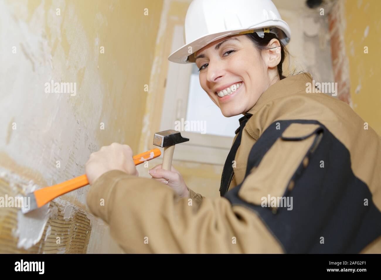 Frau Maurer den Abriss der Mauer Stockfoto