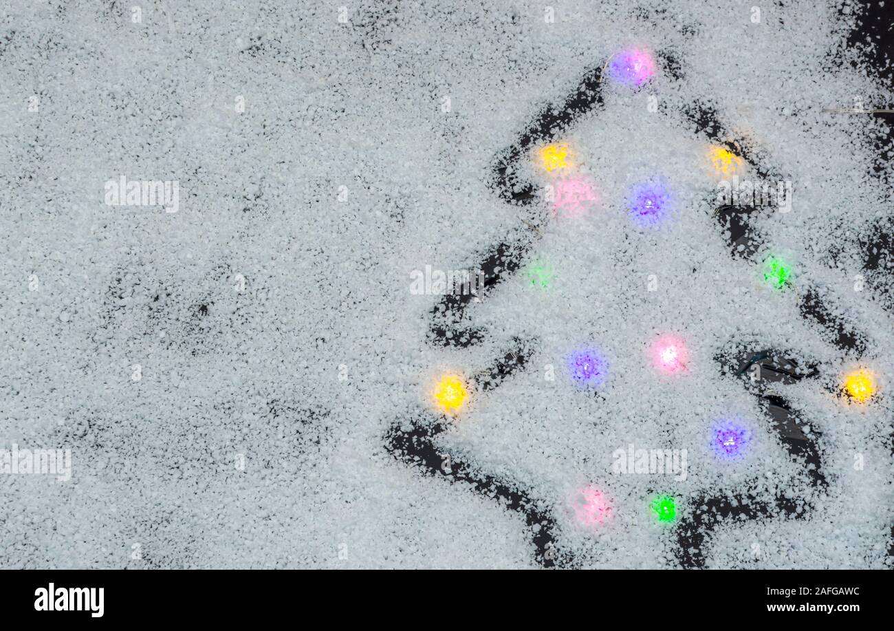 Christmas lights Hintergrund und Schnee, Platz für Weihnachten text Stockfoto
