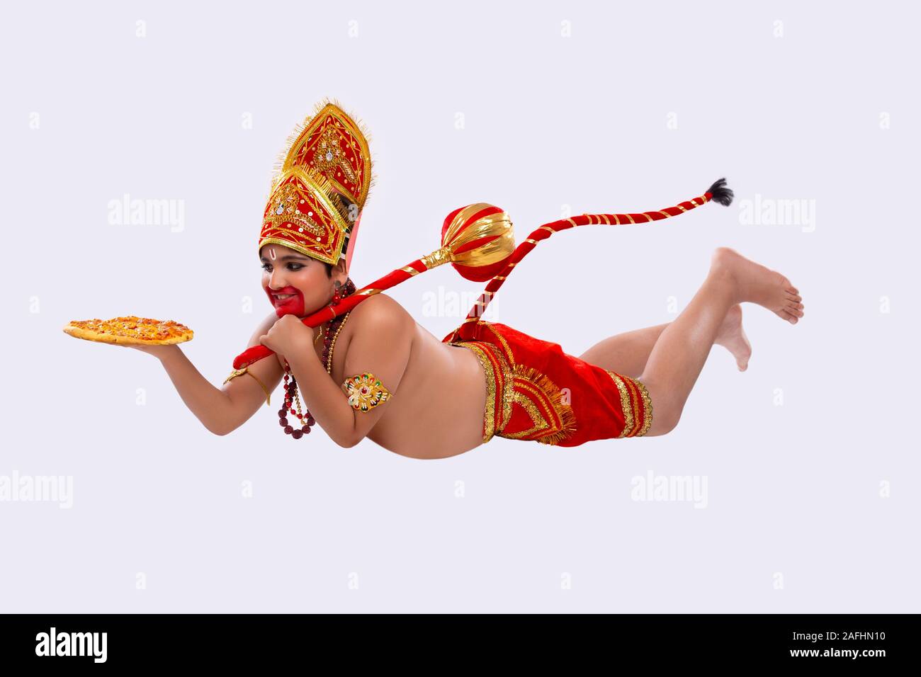 Herr Hanuman liefern Pizza Stockfoto