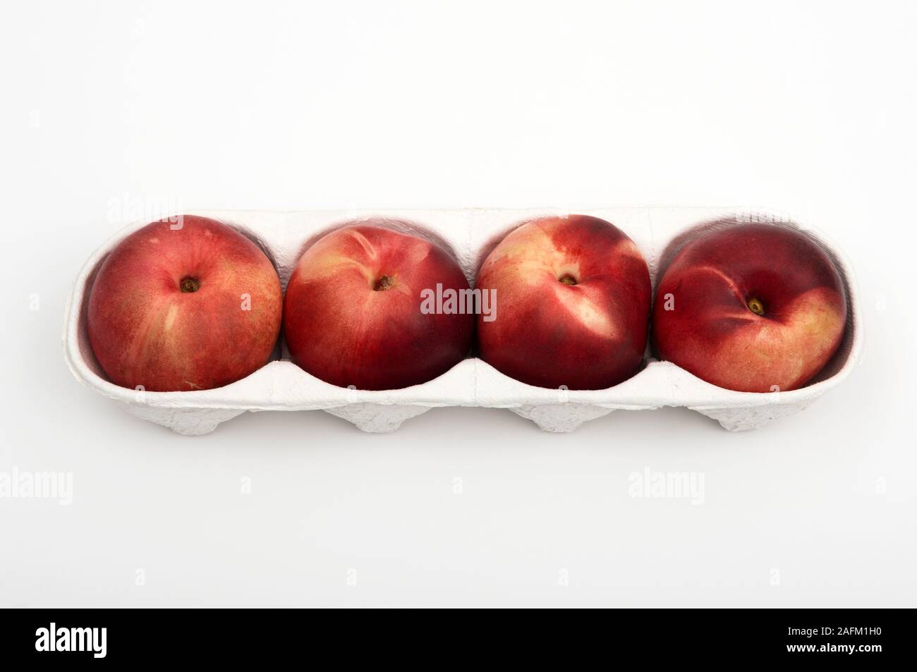 Donut oder flache frische Pfirsiche Stockfoto