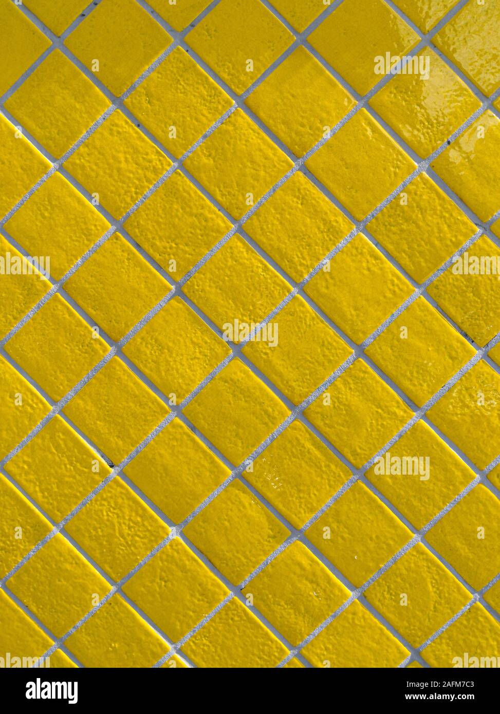 Full Frame Detailansicht des gelben Fliesen- wand Stockfoto