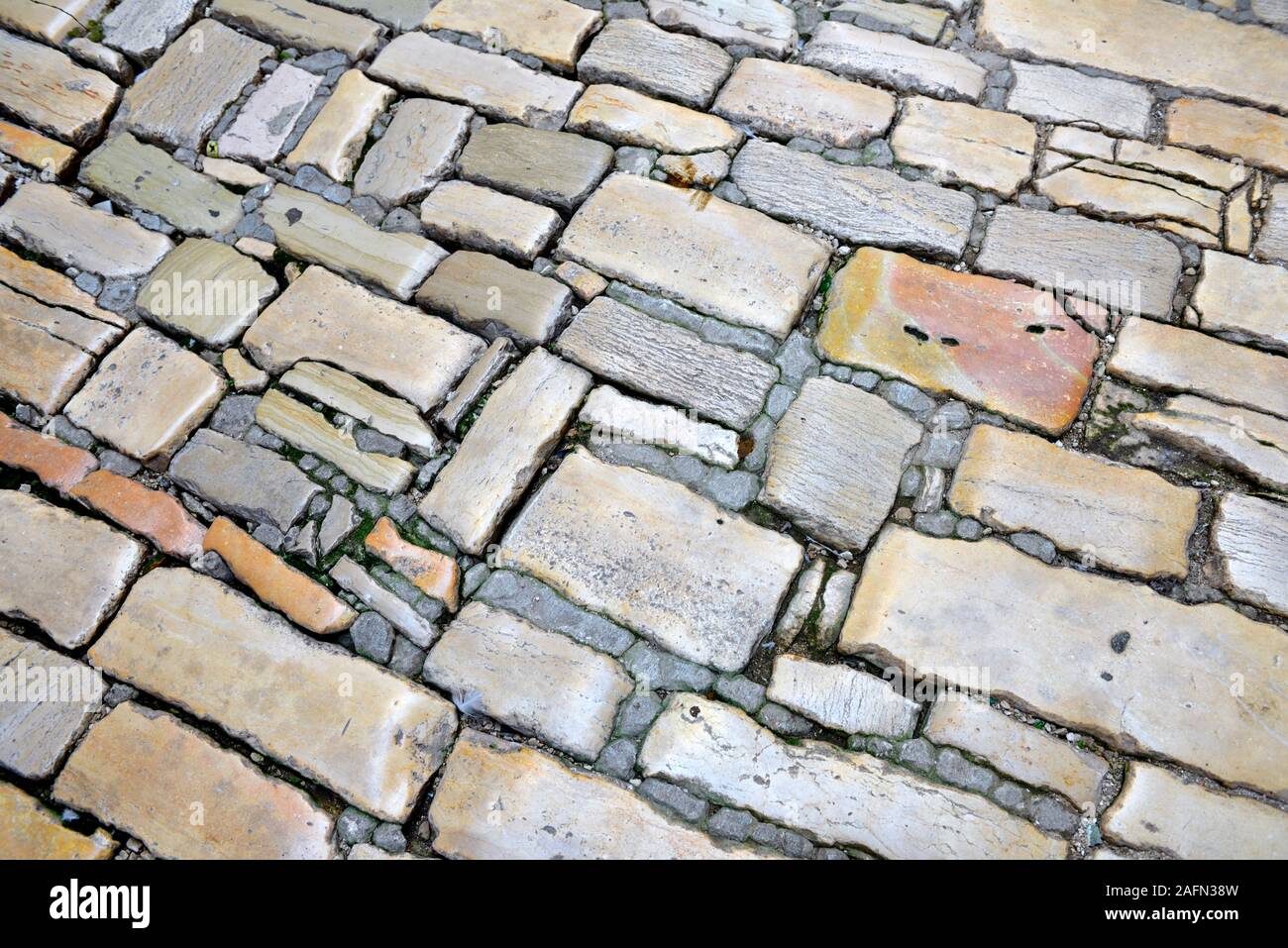 Alte Stein Pflasterung Hintergrund Stockfoto