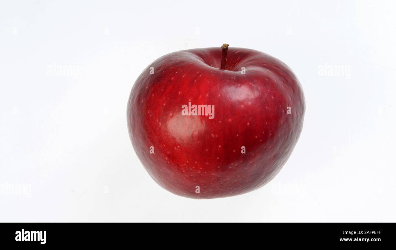 Frischer roter Apfel auf einem weißen Hintergrund Stockfoto
