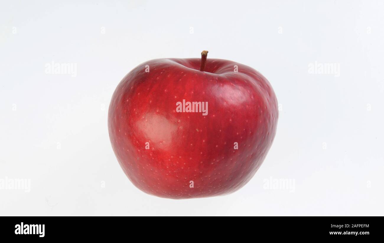 Frischer roter Apfel auf einem weißen Hintergrund Stockfoto