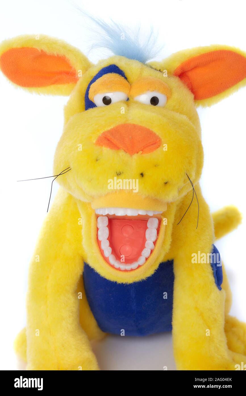 Star Smilez Spielzeug für gelbe Löwen, um Kindern das Bürsten beizubringen Zähne Stockfoto