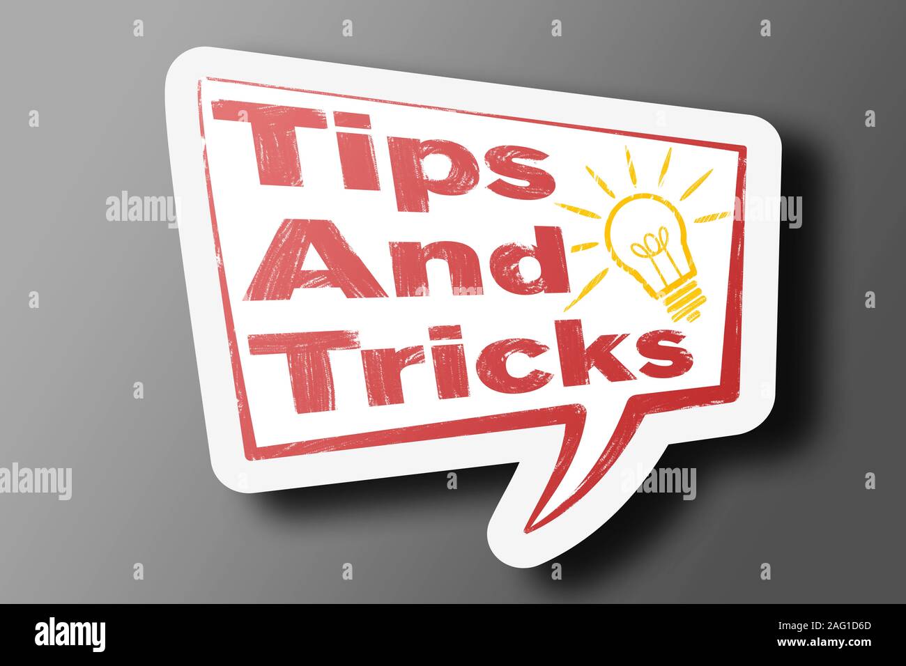 Text TIPPS UND TRICKS für die Sprechblase geschrieben, Tipps Stockfoto