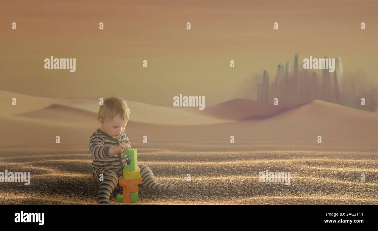 Der kleine Junge ist ein Toy Tower in der Wüste auf dem Hintergrund der großen Stadt im Sand Storm Stockfoto
