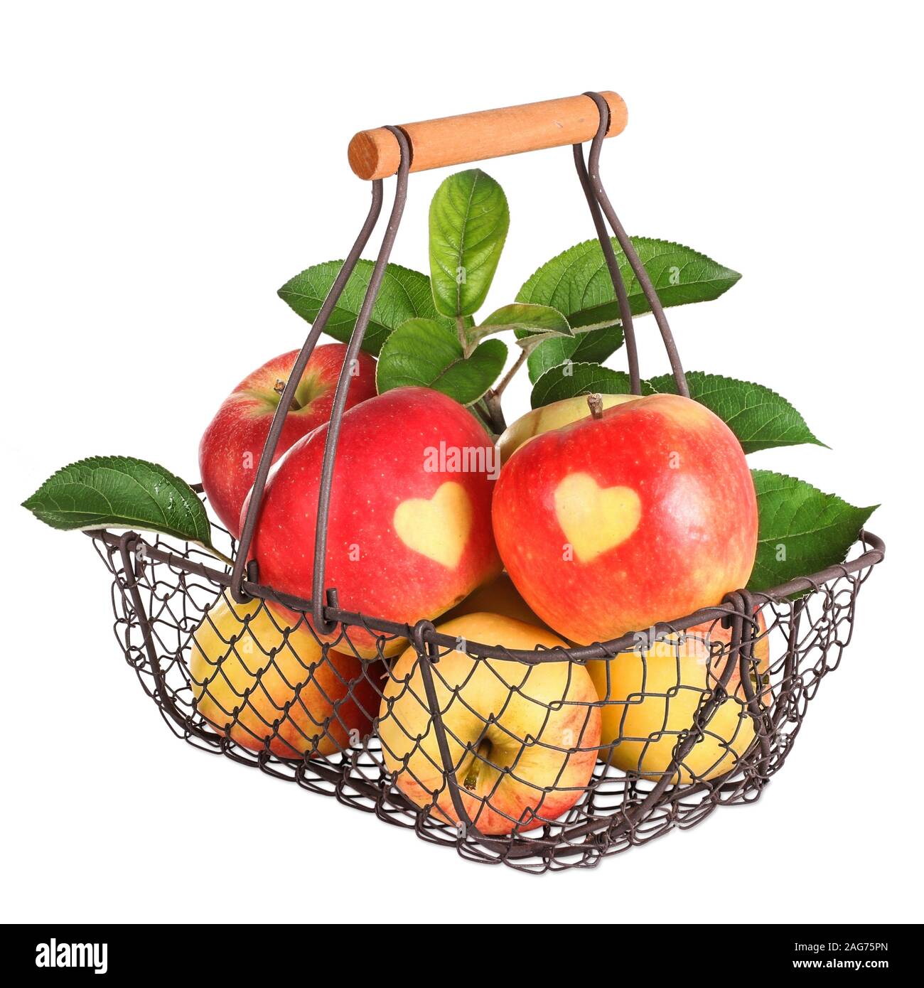 Korb mit Äpfel und ein Herz auf Ihn Stockfoto