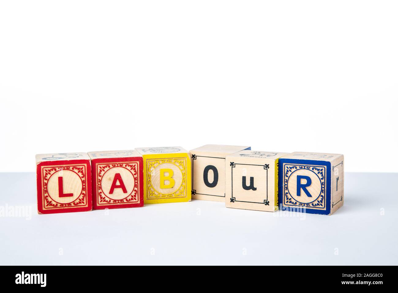 Kinder Holz- Alphabet Bausteine Rechtschreibung das Wort Arbeit Stockfoto