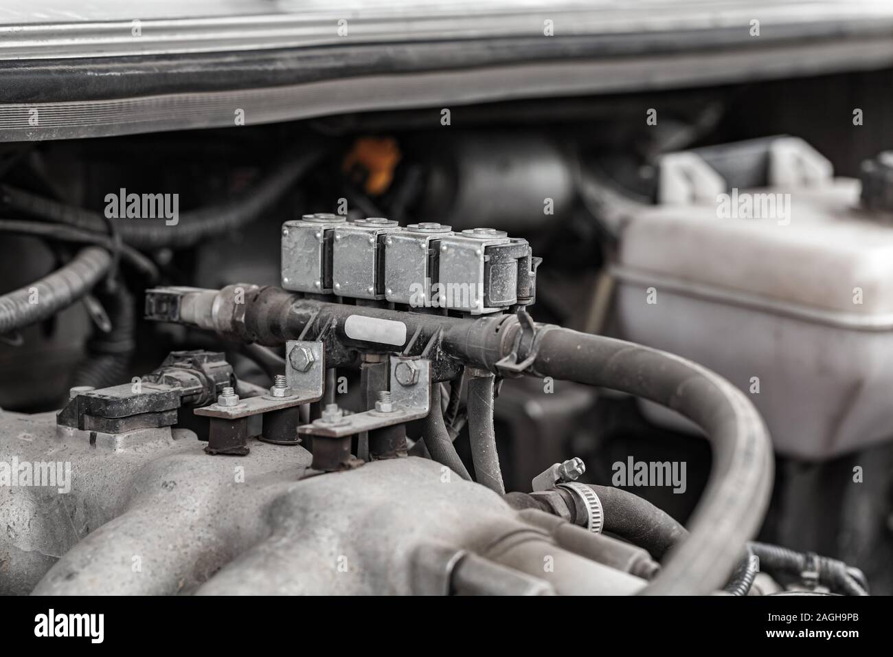 Treibgasanlage Teile eines Hybridautos, gasdüsen Nahaufnahme mit selektiver Weichzeichner Stockfoto