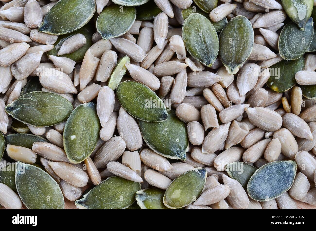 Full Frame der Samen Hintergrund - makroaufnahme von geschälten Kürbis- und Sonnenblumenkerne Stockfoto