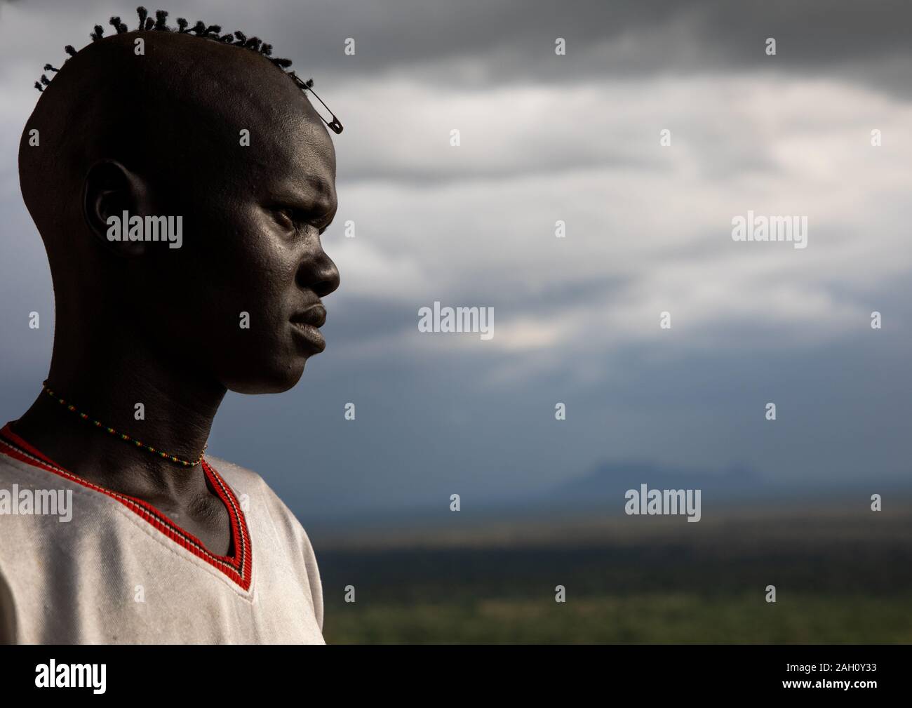 Lotuko Stamm Mann mit einem speziellen Frisur, Central Equatoria, Illeu, South Sudan Stockfoto