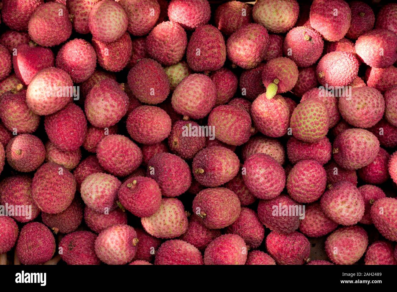 Frische rote Litschi Früchte Hintergrund Stockfoto
