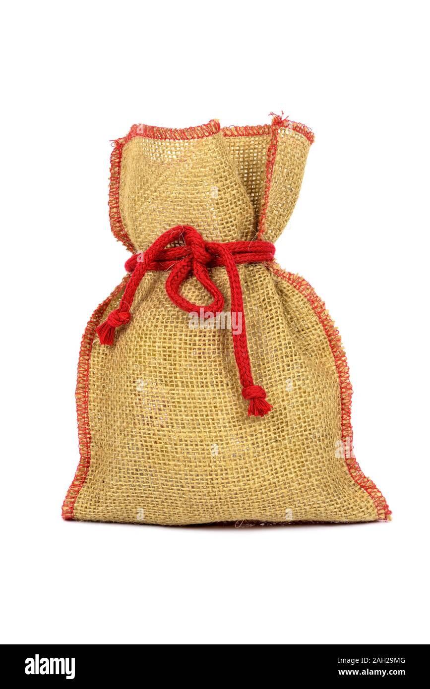 Textile Sack mit roter String auf weißem Hintergrund Stockfoto