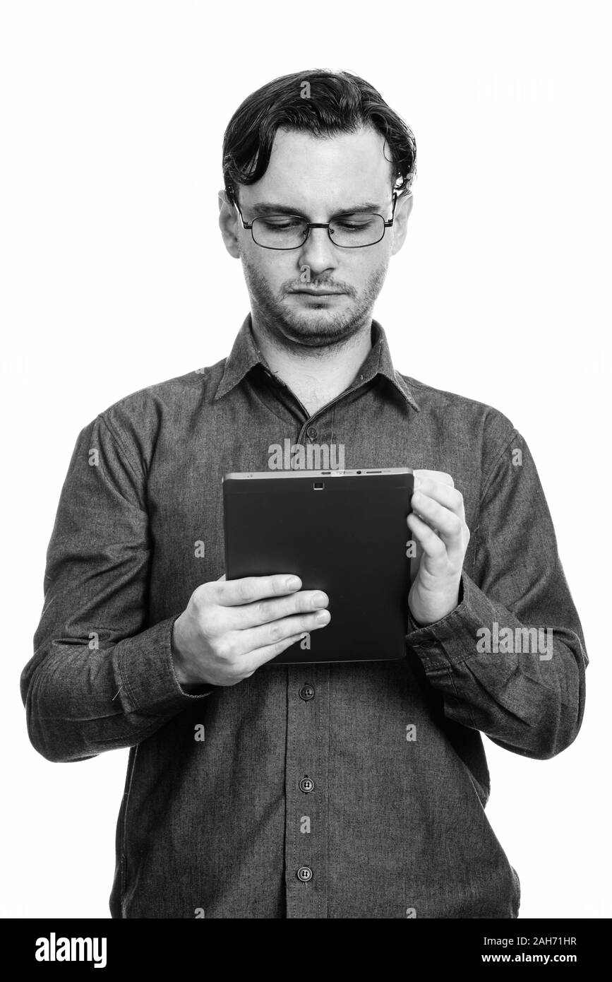 Studio shot der formalen Junge mit digitalen tablet Mann Stockfoto