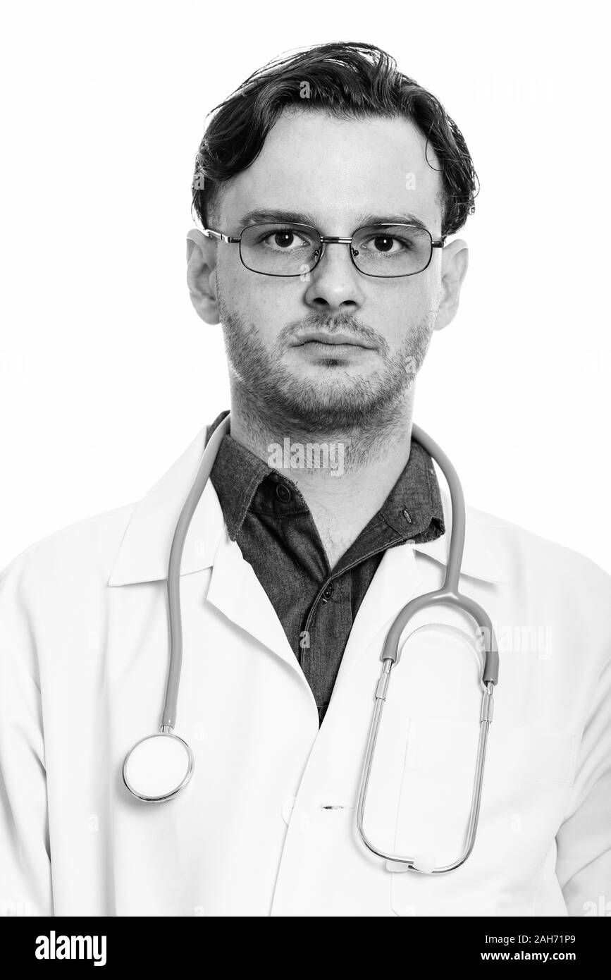 Gesicht des jungen Mannes, Arzt mit Brillen in Schwarz und Weiß Stockfoto