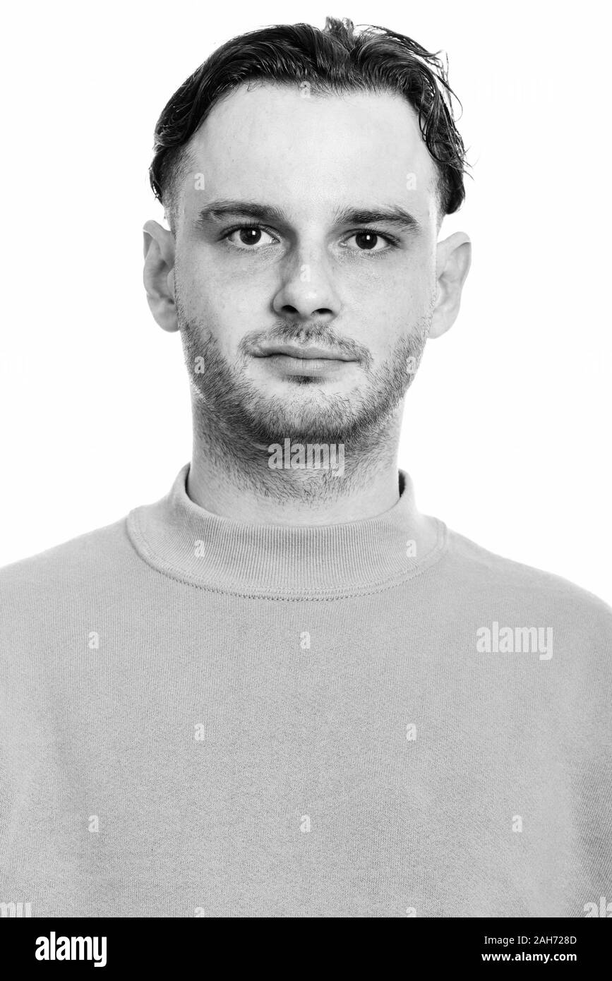 Der junge Mann an der Kamera auf der Suche Stockfoto