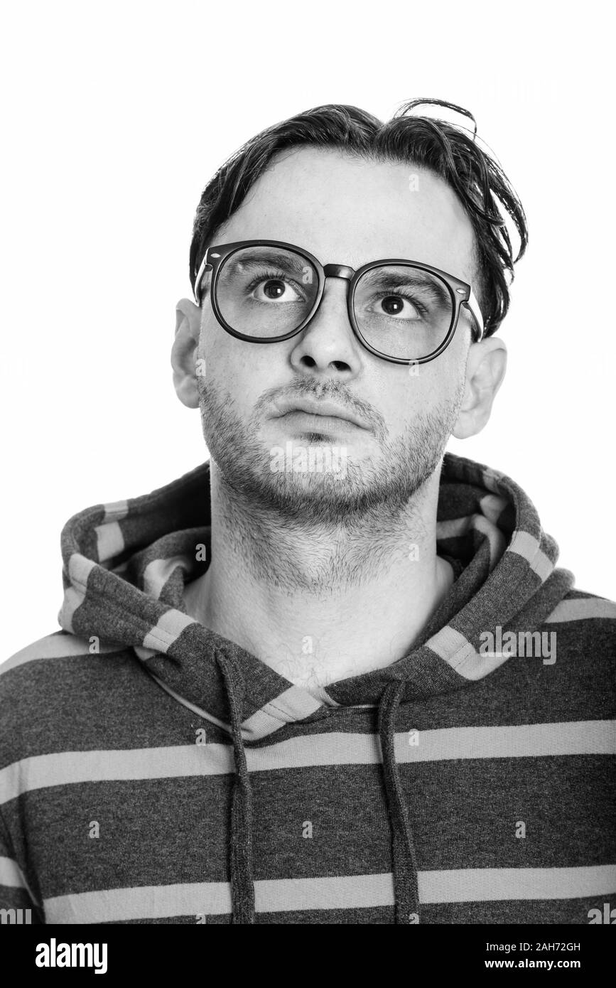 Gesicht der jungen Mann mit Brille, beim Denken Stockfoto