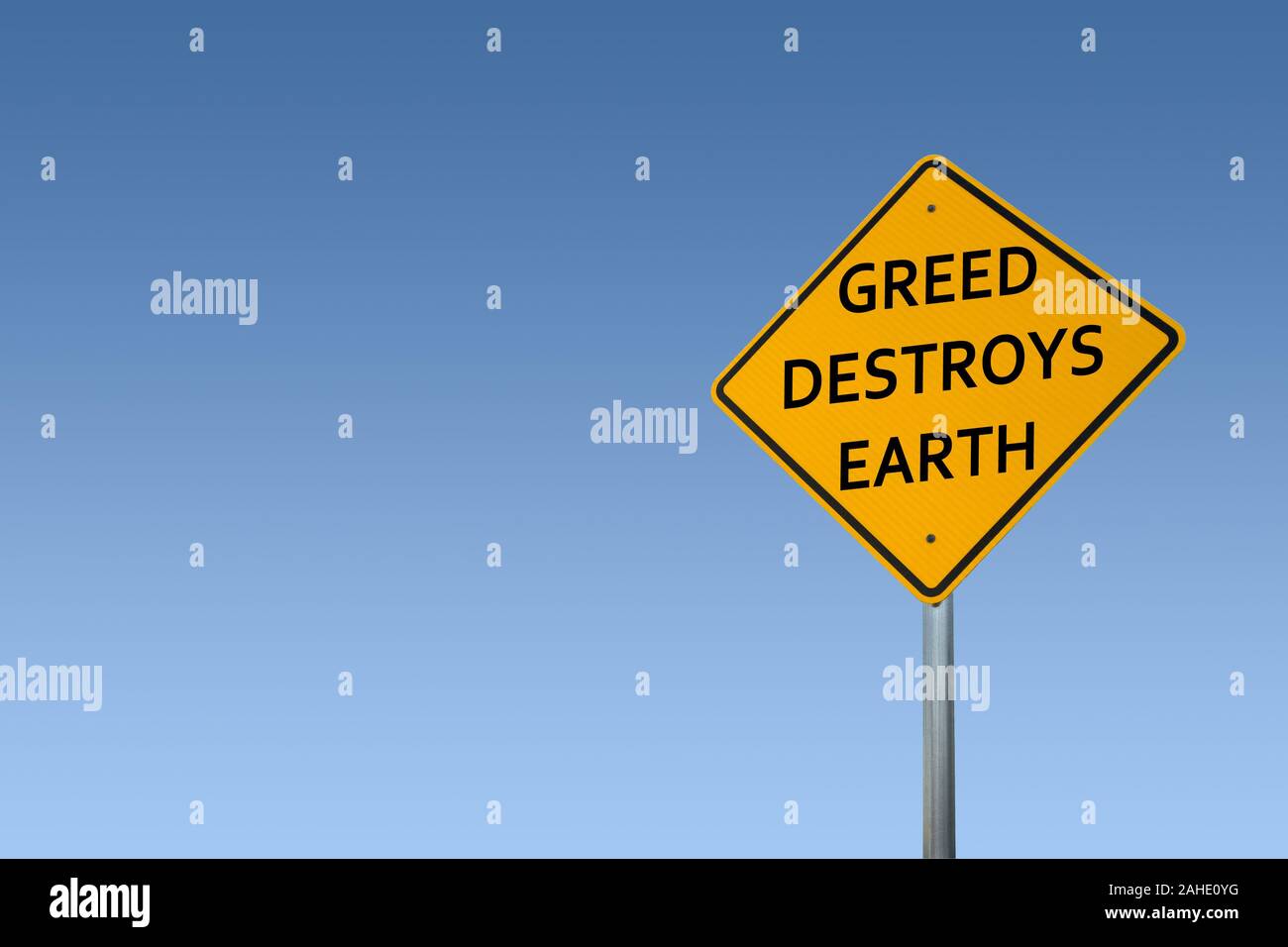 "Habgier zerstört die Erde' Schild Stockfoto