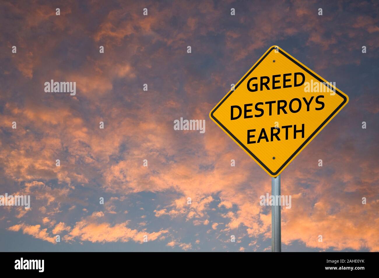 "Habgier zerstört die Erde' Schild Stockfoto