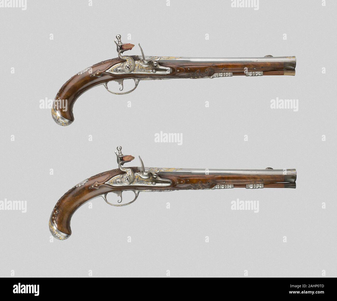 Paar Flintlock Pistolen. 1715 - 1725. Suhl. Stahl, Vergoldung, Gold, und Walnuss Stockfoto