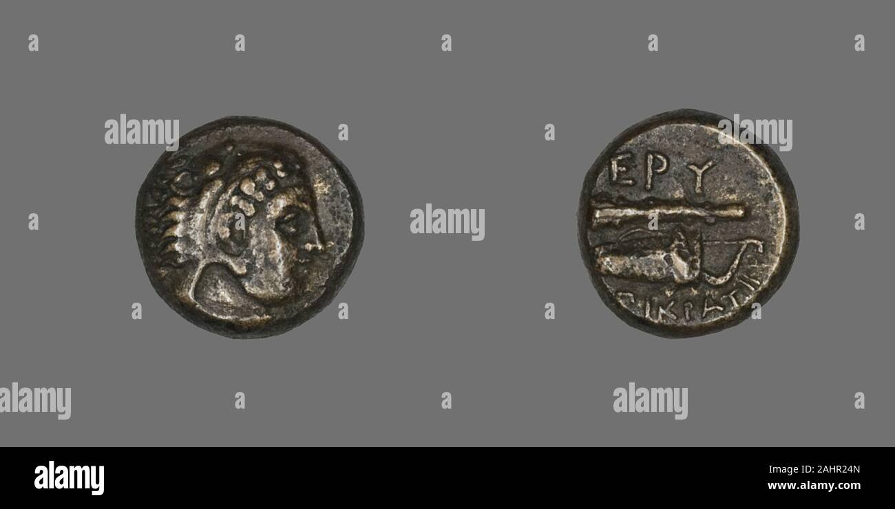 Antike Griechische. Münze mit der Darstellung der Held Herakles. 400 v.  Chr. - 300 v. Chr.. Griechenland. Bronze die Verwendung von Münzen als Form  des Geldes im westlichen Kleinasien im frühen 7.
