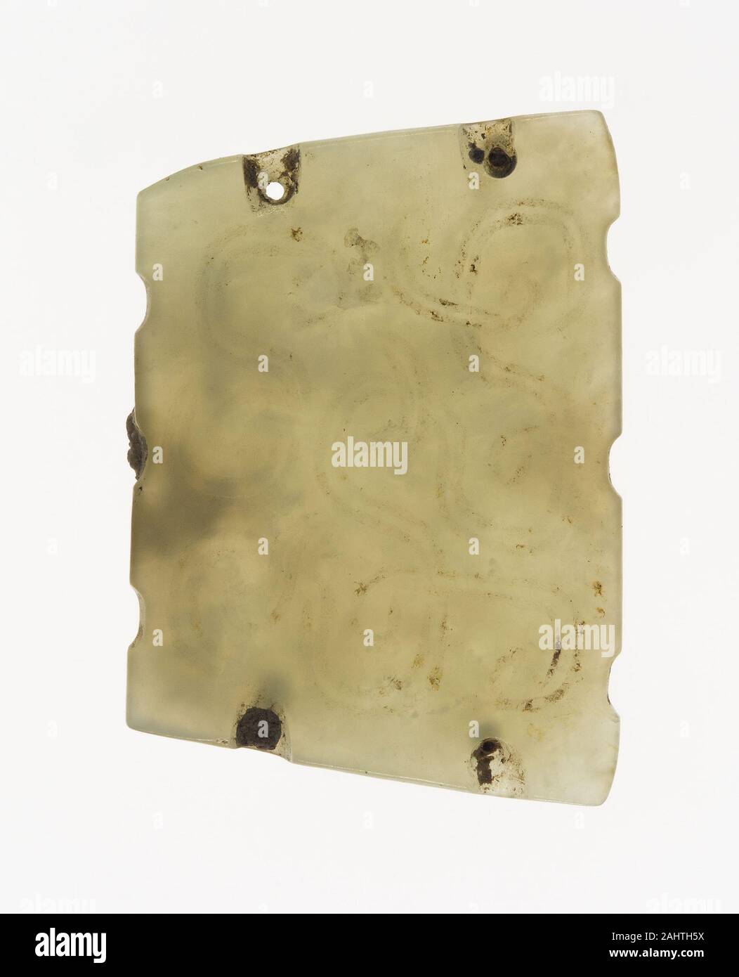 Plakette mit verketteten Schriftrollen. 700 v. Chr. - 600 v. Chr.. China. Jade Stockfoto