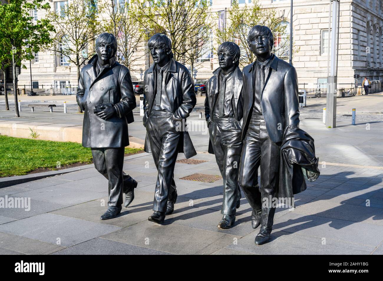 Bronzestatue von Pop group The Beatles (2015), von Andrew Edwards, Pier Head, Liverpool, England, UK. Stockfoto