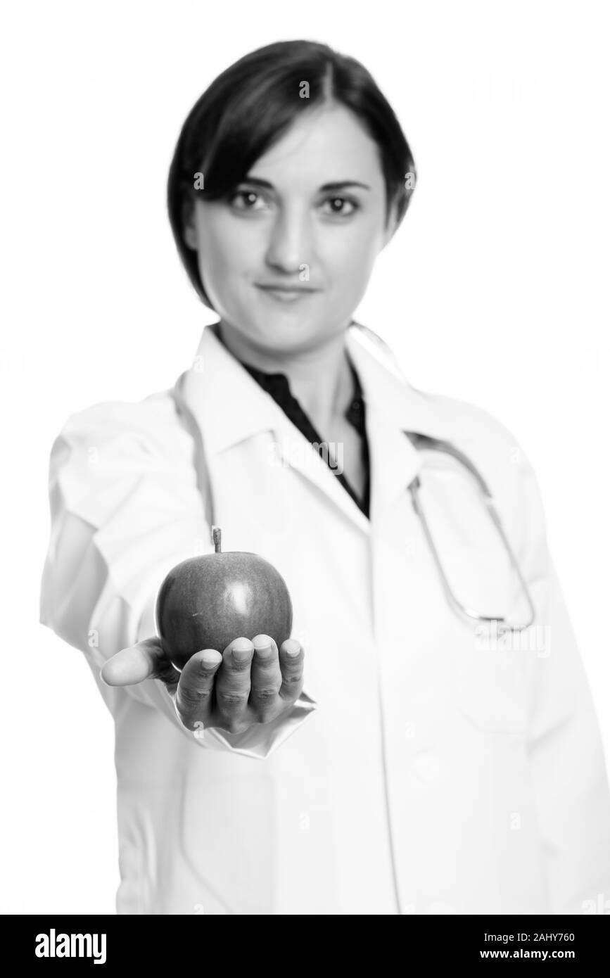 Porträt der schönen Frau Doktor als Ernährungsberaterin mit Apple Stockfoto