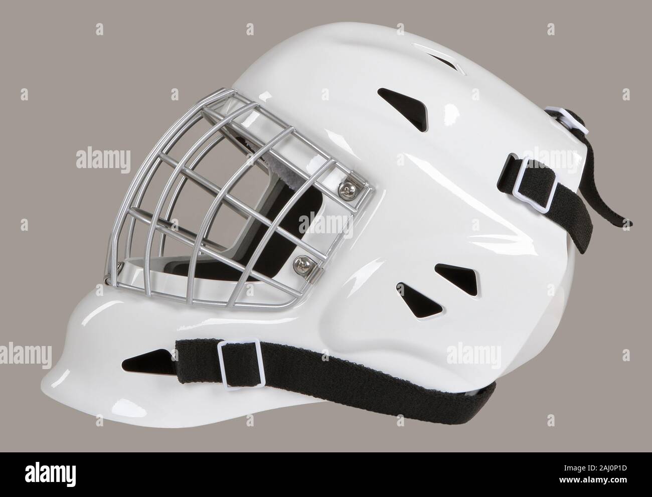 Hockey goalie weißen Helm Maske auf grauem Hintergrund Stockfoto