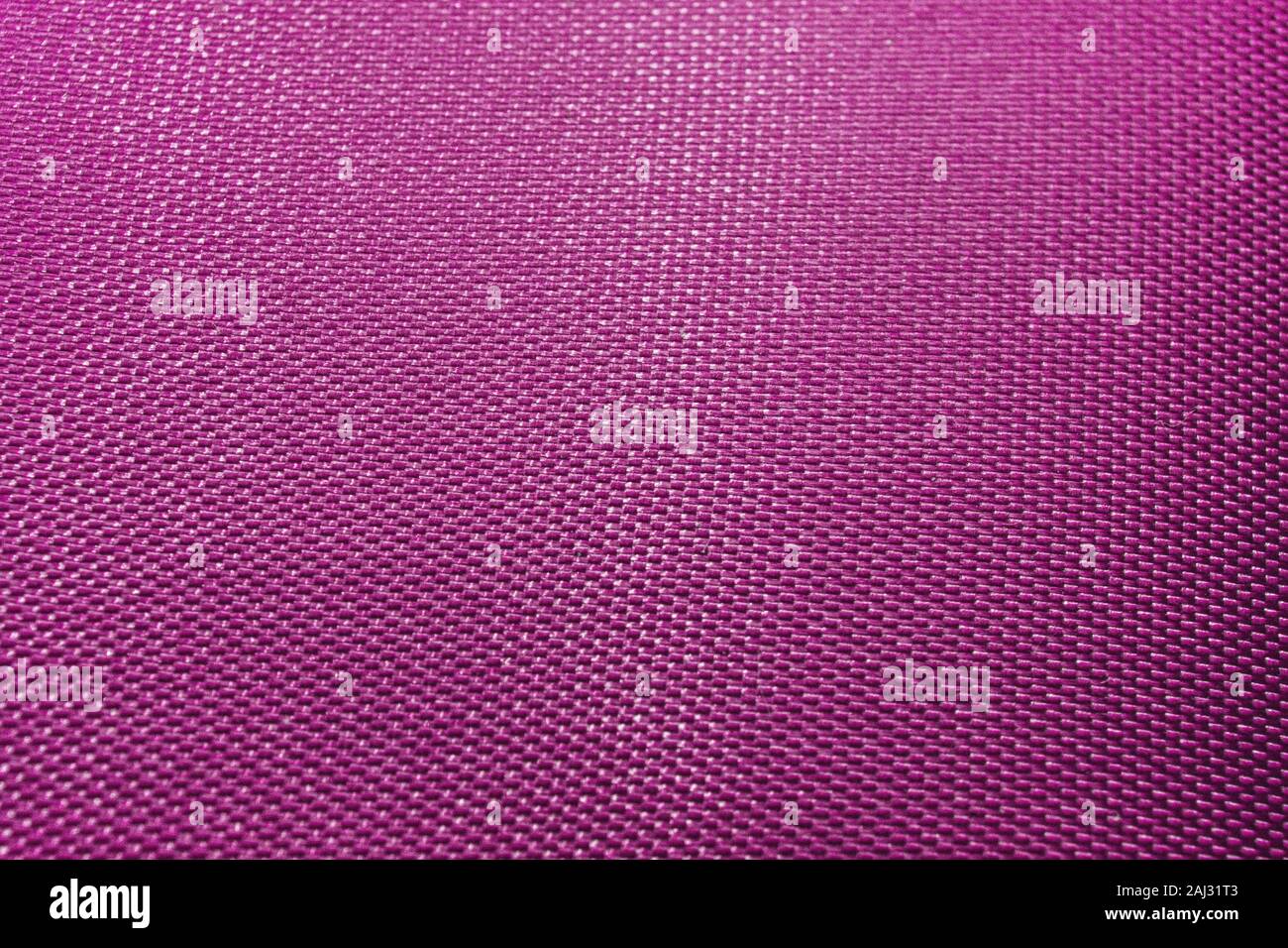 Nahaufnahme der abstrakten Flachbild purple High Detail texturierte Bekleidung Stoff Muster Hintergrund in teilweiser konzentrieren und realistische Lichtreflexionen Stockfoto