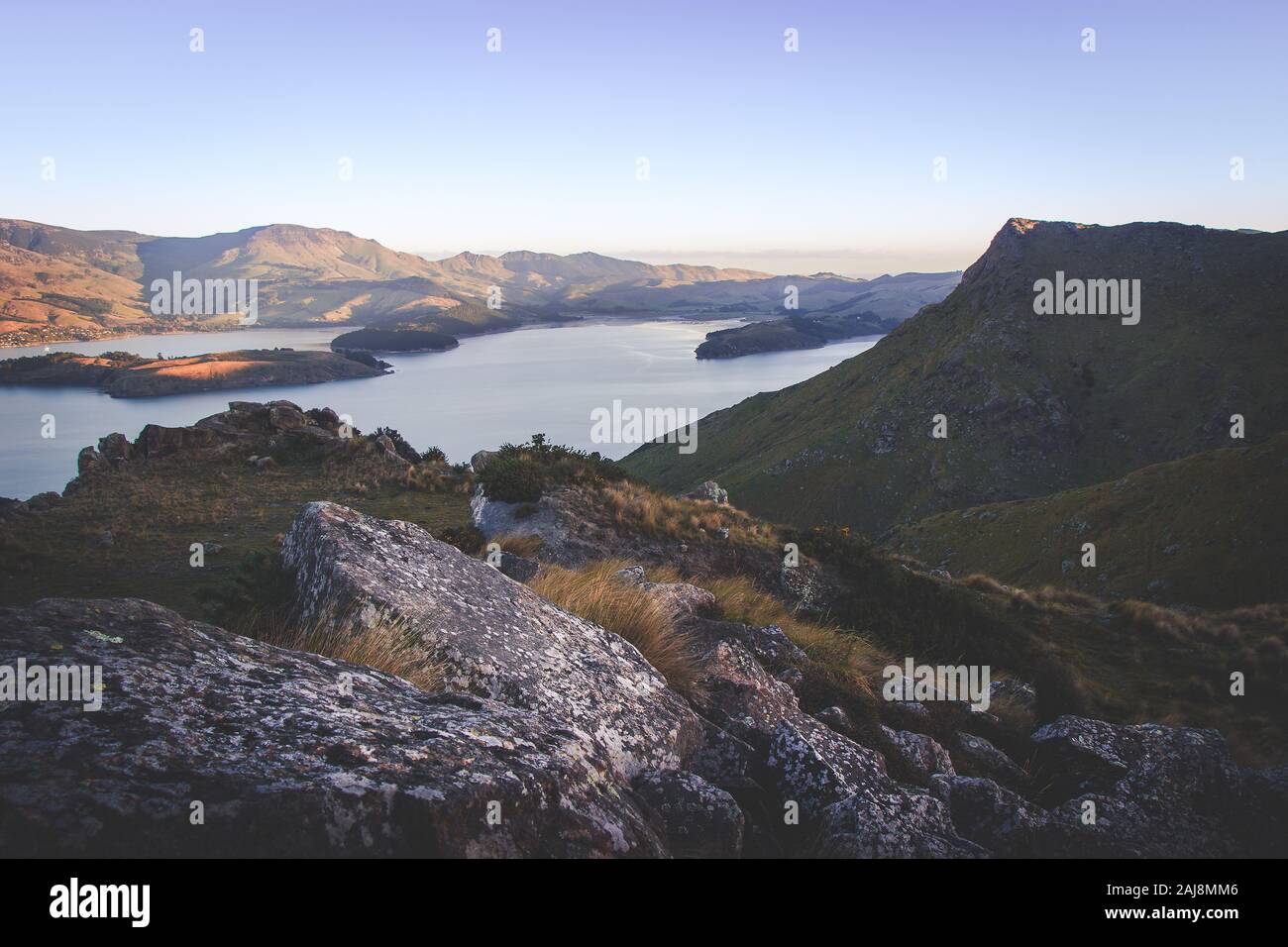 Sonnenuntergang bei Port Hills, Christchurch, Neuseeland Stockfoto