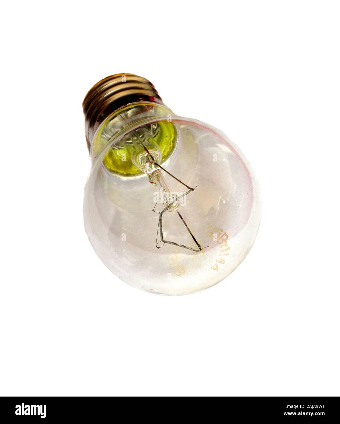 Eine elektrische Glühlampe mit einer Nichromspirale und einem runden, transparenten Glas. Nahaufnahme . Stockfoto
