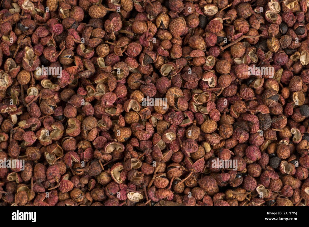 Sichuan Pfeffer Hintergrund. Natürliche Gewürze Textur. Lebensmittelzutat. Stockfoto