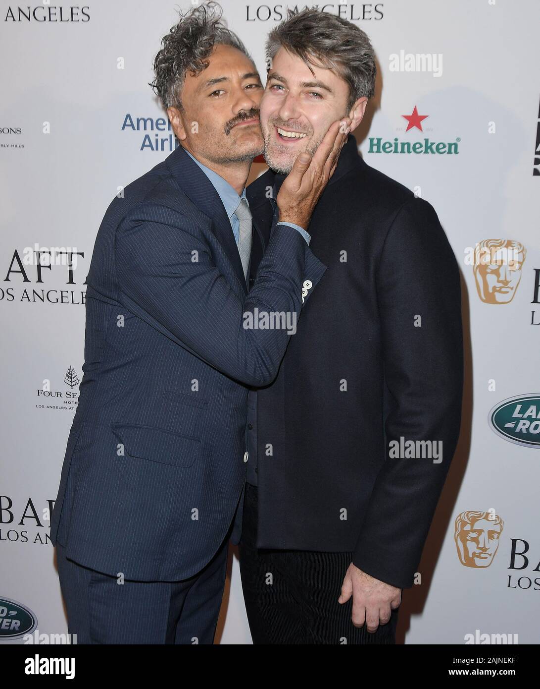 Beverly Hills, USA. 04 Jan, 2020. (L - R) Taika Waititi und Carthew Neal bei der BAFTA-Los Angeles Tea Party statt im Four Seasons Hotel Los Angeles, Beverly Hills, CA am Samstag, 4. Januar 2020. (Foto durch Sthanlee B. Mirador/Sipa USA) Credit: Sipa USA/Alamy leben Nachrichten Stockfoto