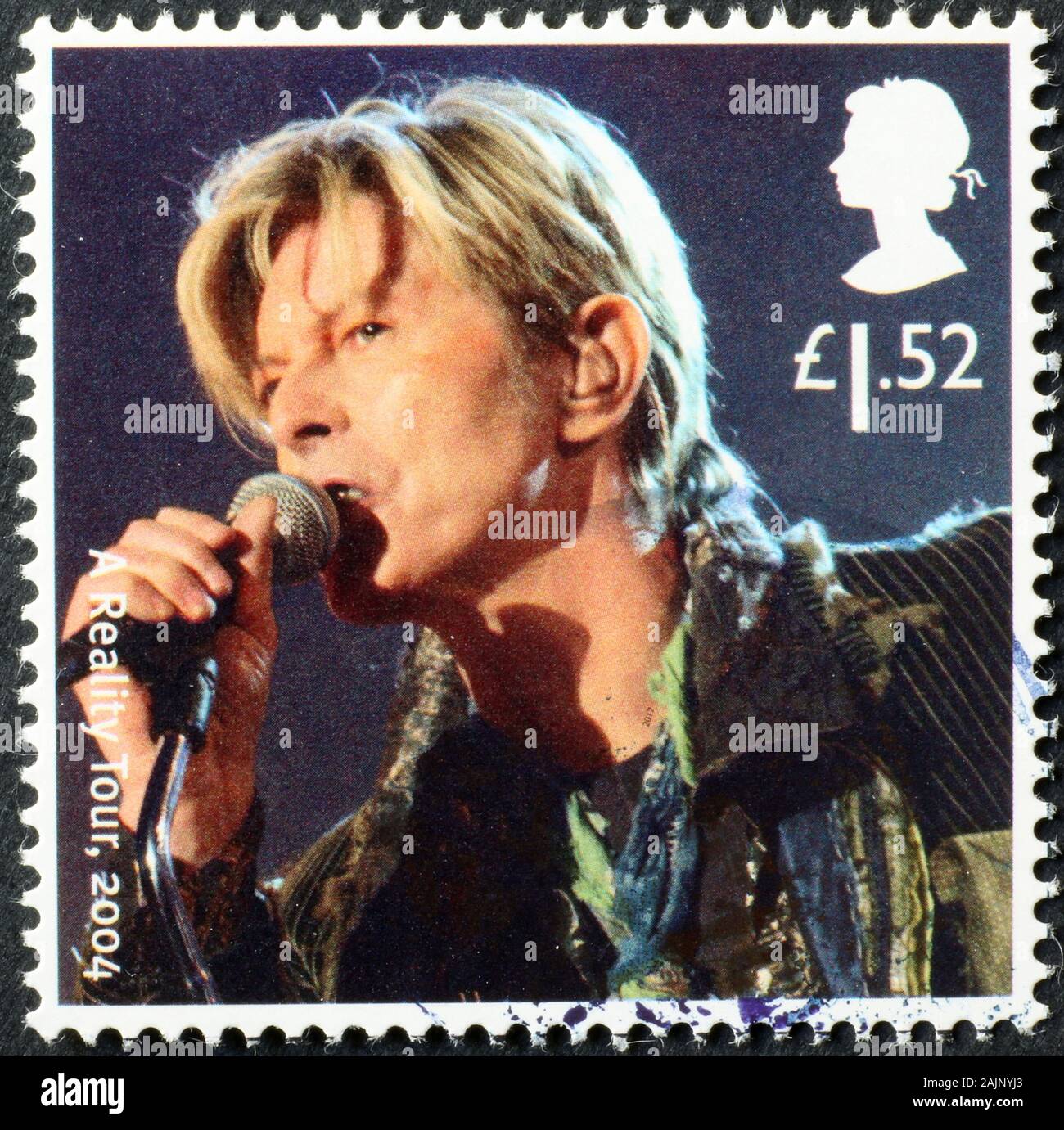 David Bowie im Konzert auf Briefmarke Stockfoto