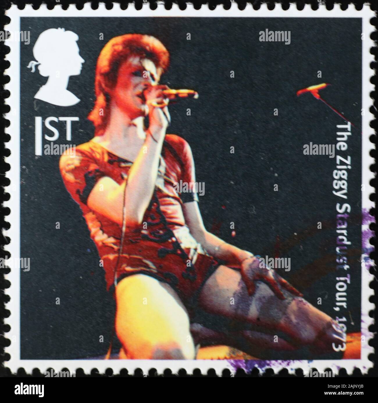 David Bowie im Konzert auf Briefmarke Stockfoto