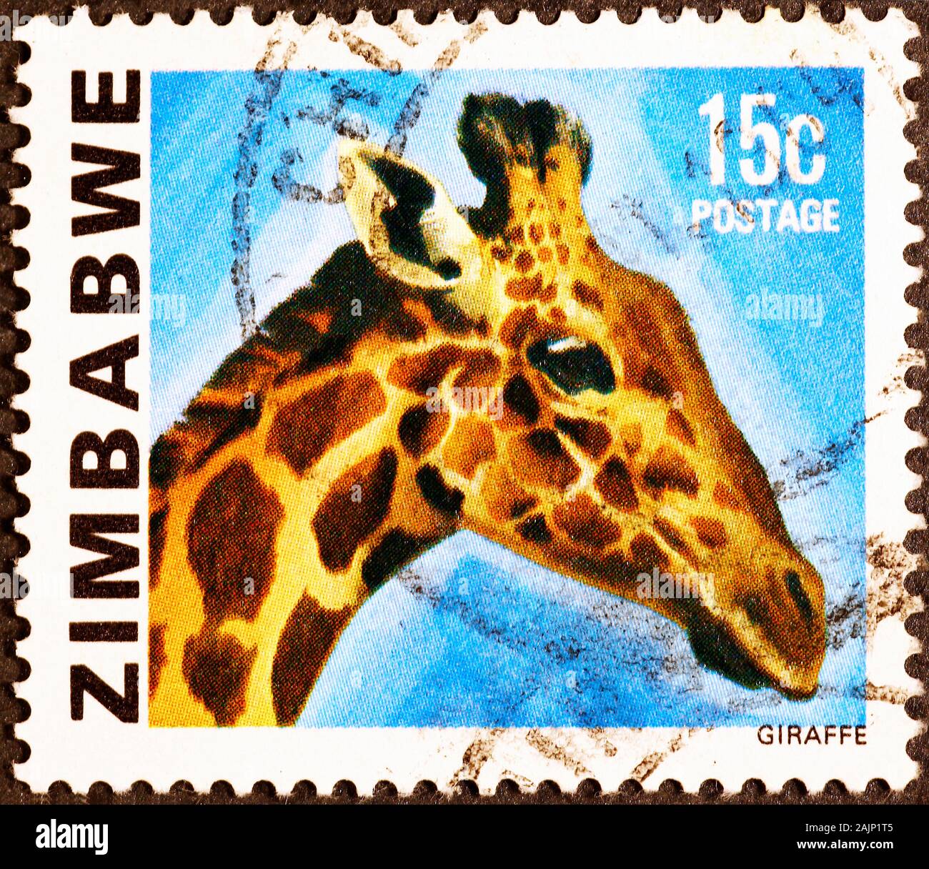 Kopf der Giraffe auf Briefmarke von Simbabwe Stockfoto