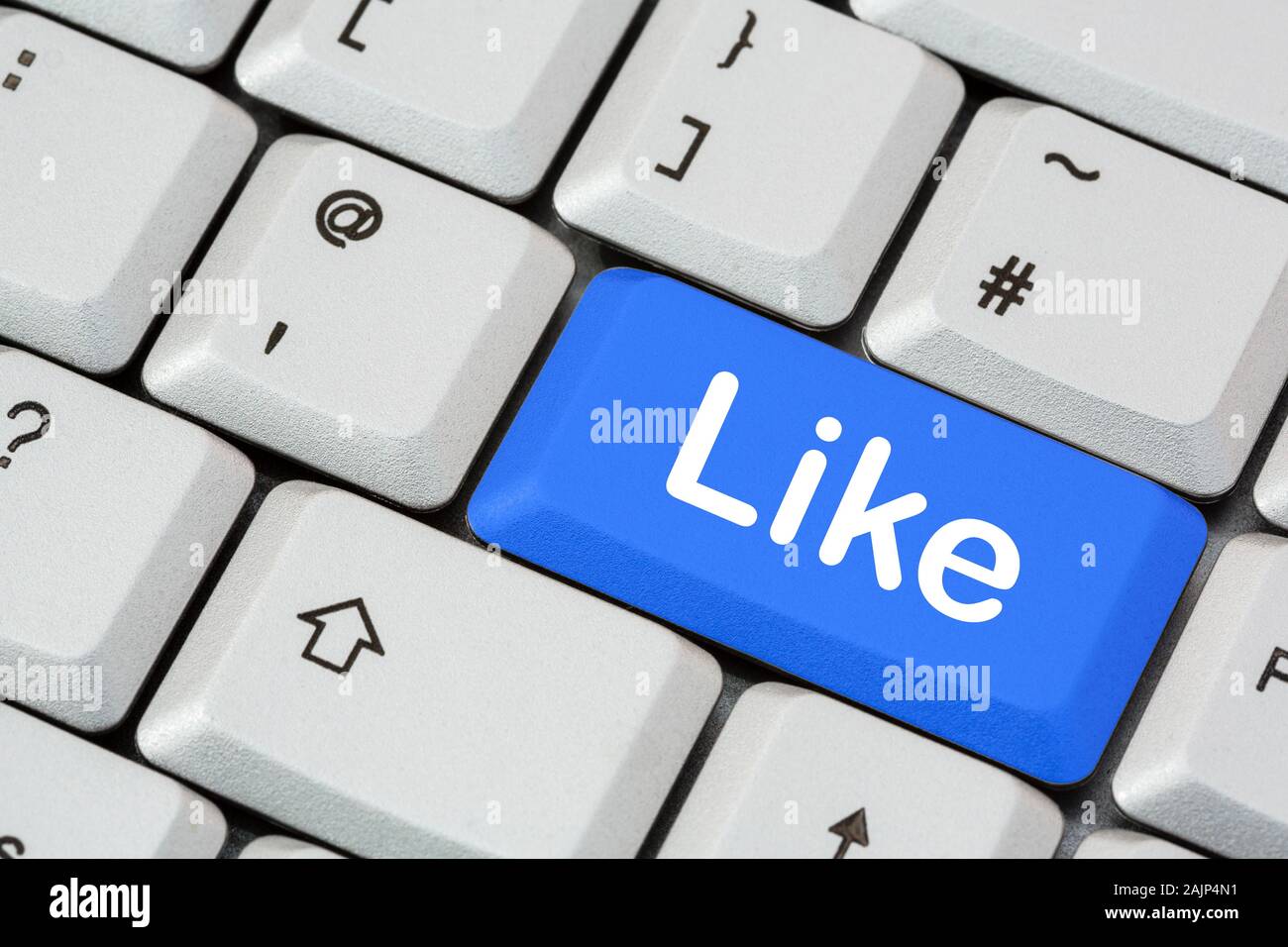 Eine Tastatur mit dem Wort wie in weißer Schrift auf einer blauen ENTER-Taste. Konzept für soziale Medien und Facebook-Netzwerke. England, Großbritannien, Großbritannien Stockfoto