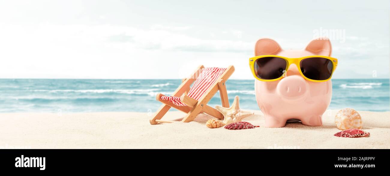 Sparschwein auf Urlaub. Geld sparen - Konzept Stockfoto