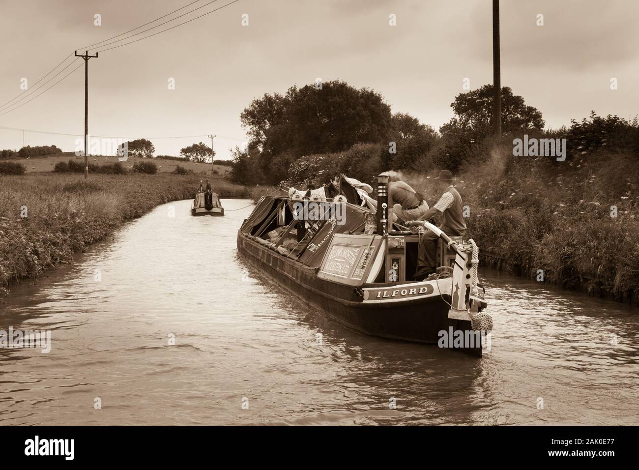 Old Working Narrow Boat Motor und Butty (Ilford) auf dem Coventry Canal Stockfoto