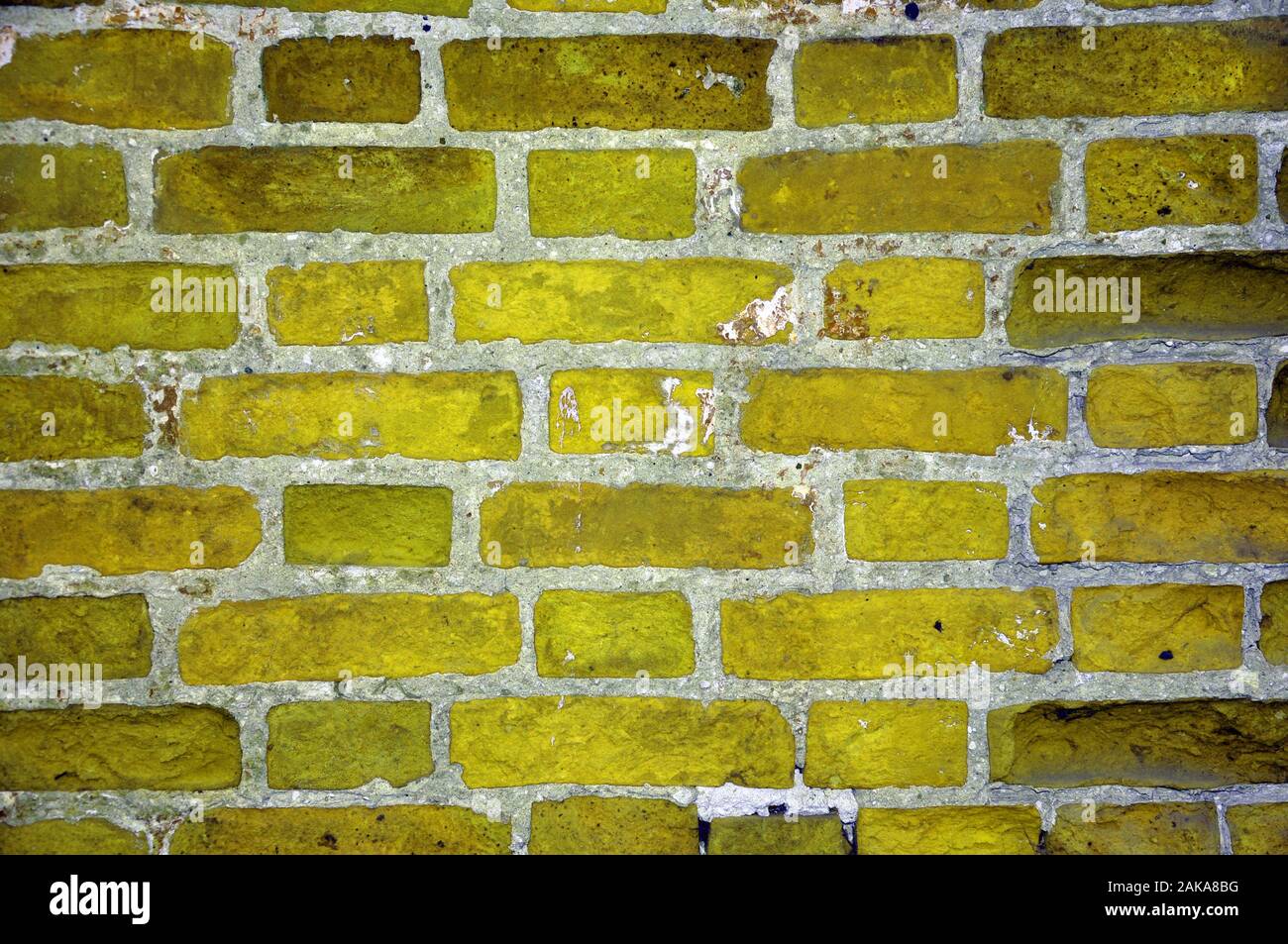 Alte Mauer von gelben Backstein. Textur, Hintergrund Stockfoto