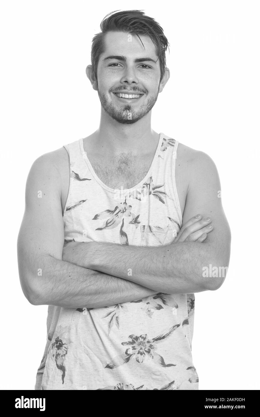 Junger glücklicher kaukasischer Mann bereit für Urlaub Stockfoto Junger glücklicher kaukasischer Mann bereit für Urlaub Stockfoto