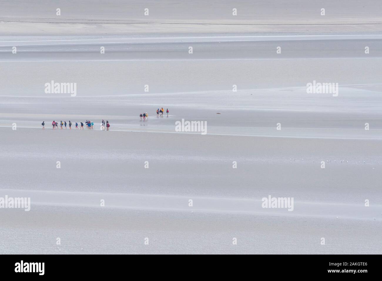 Frankreich, Manche, der Mont Saint Michel Bucht UNESCO Weltkulturerbe, Menschen, überqueren die Bucht Stockfoto